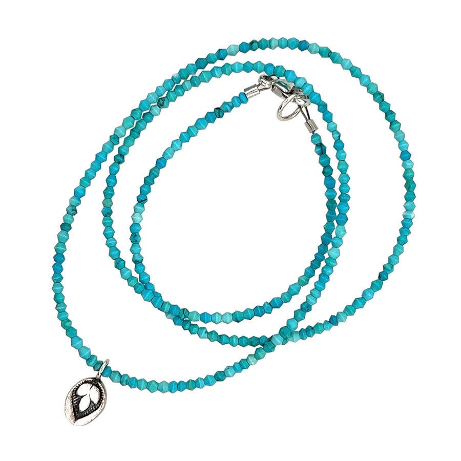 Necklace - Tiny Matte Turquoise Saucers on Silk Cord with India Leaf
